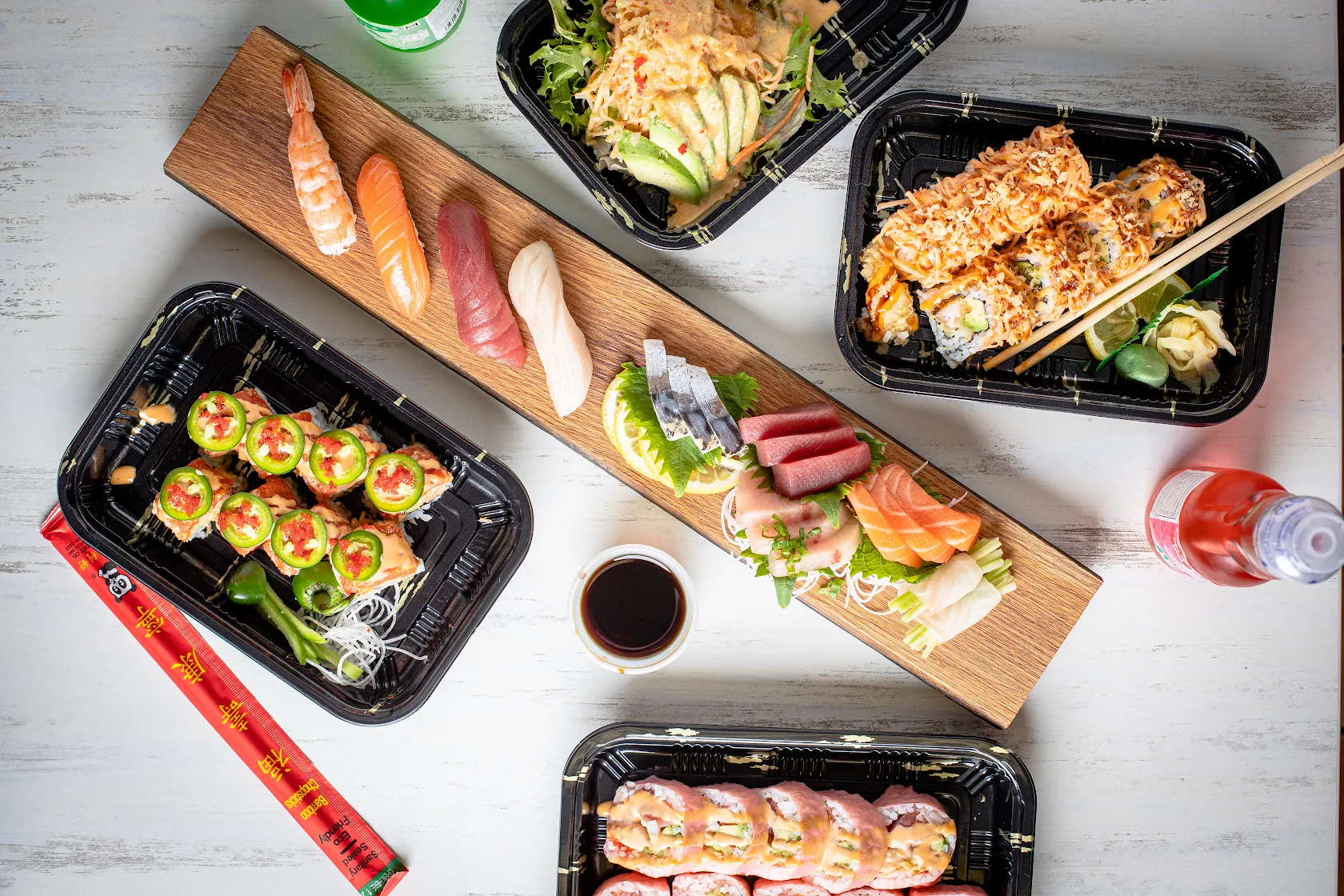 A colorful spread of Kirin sushi rolls, nigiri and sashimi