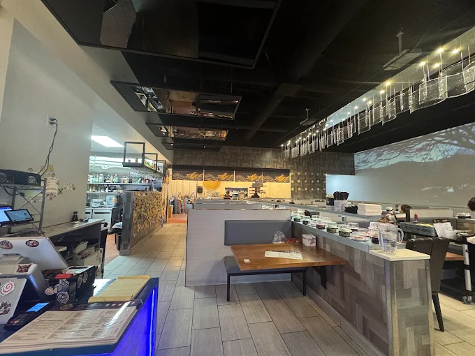 Dining booths and revolving sushi inside Sushi Train